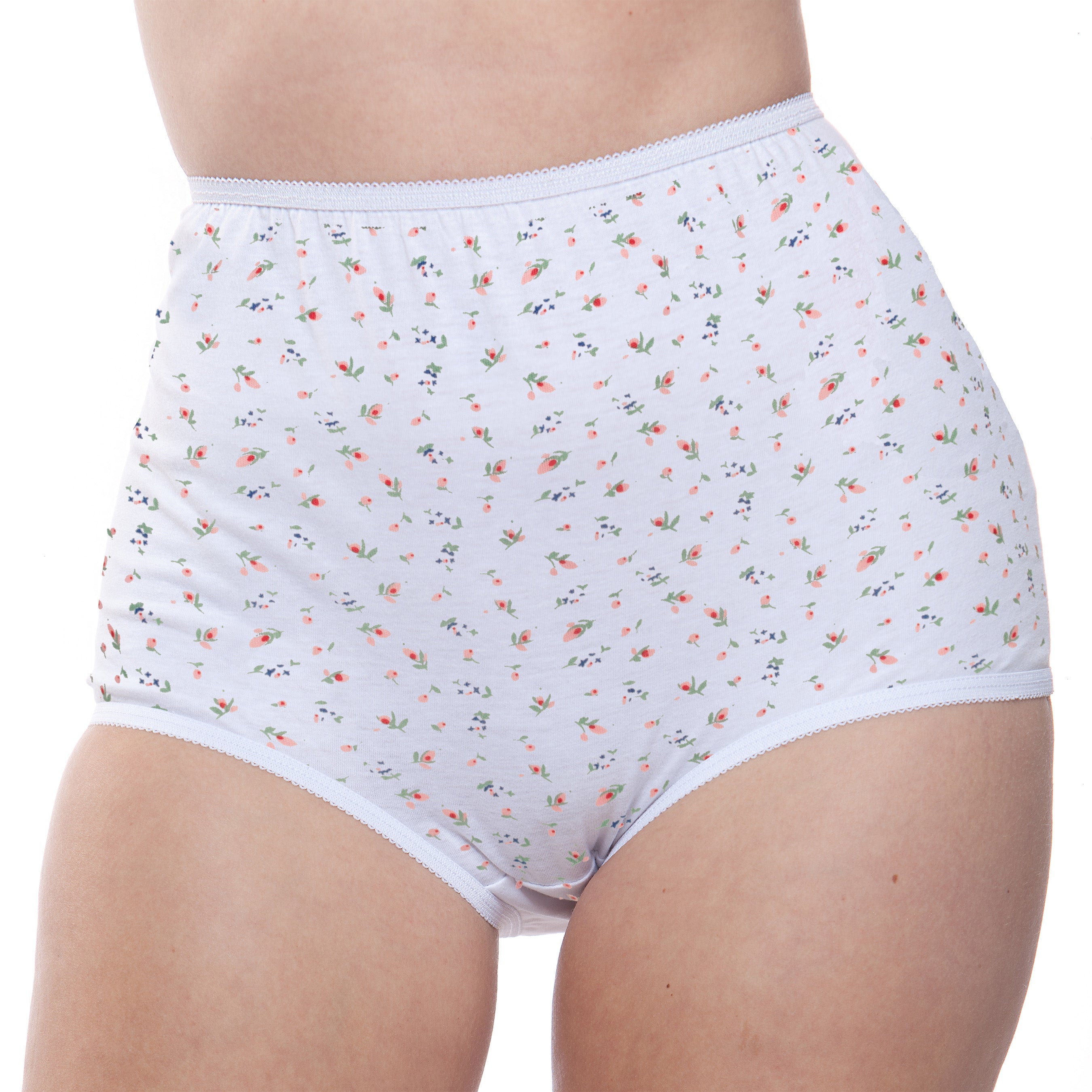 A person models Teri Lingerie’s 100% Cotton Full Coverage Panty Floral Print 6 Pack, featuring high-waisted, white floral briefs shown from mid-thigh to above the waist on a plain background.