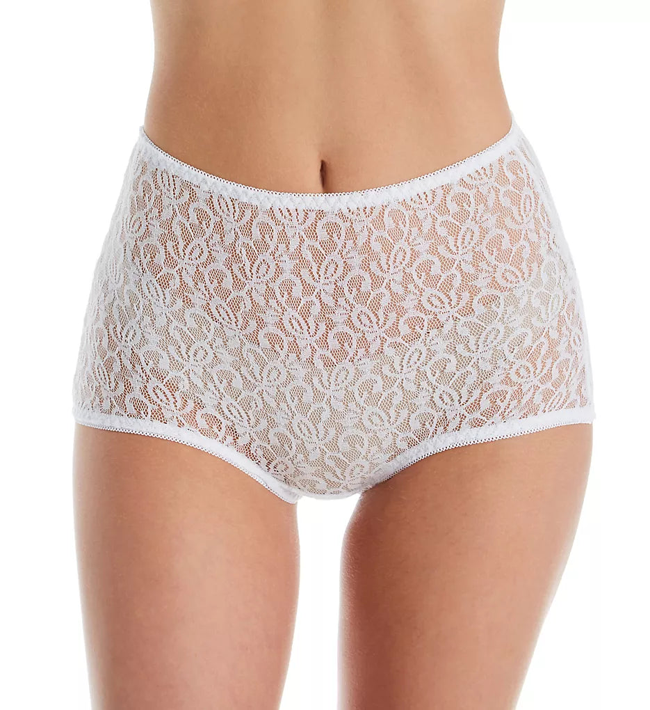 A model wears Teri Lingerie's Full Coverage Lace Brief, part of a 6 pack, in high-waisted white floral lace style, shown from mid-torso to upper thighs against a plain background.